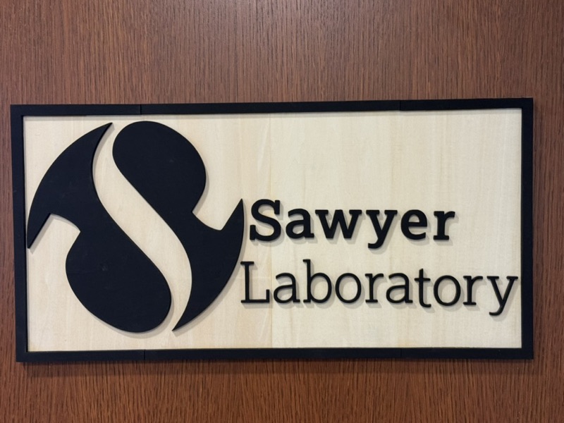The Sawyer Laboratory sign on the lab door.